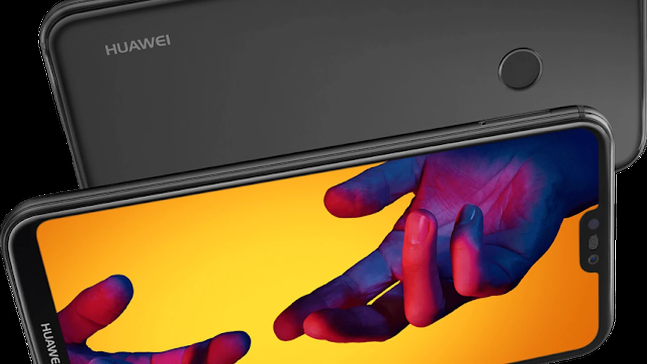 Close up on a plate of mashed potatoes, topped with baked pork chops with cream of mushroom soup, and a side of green beans.