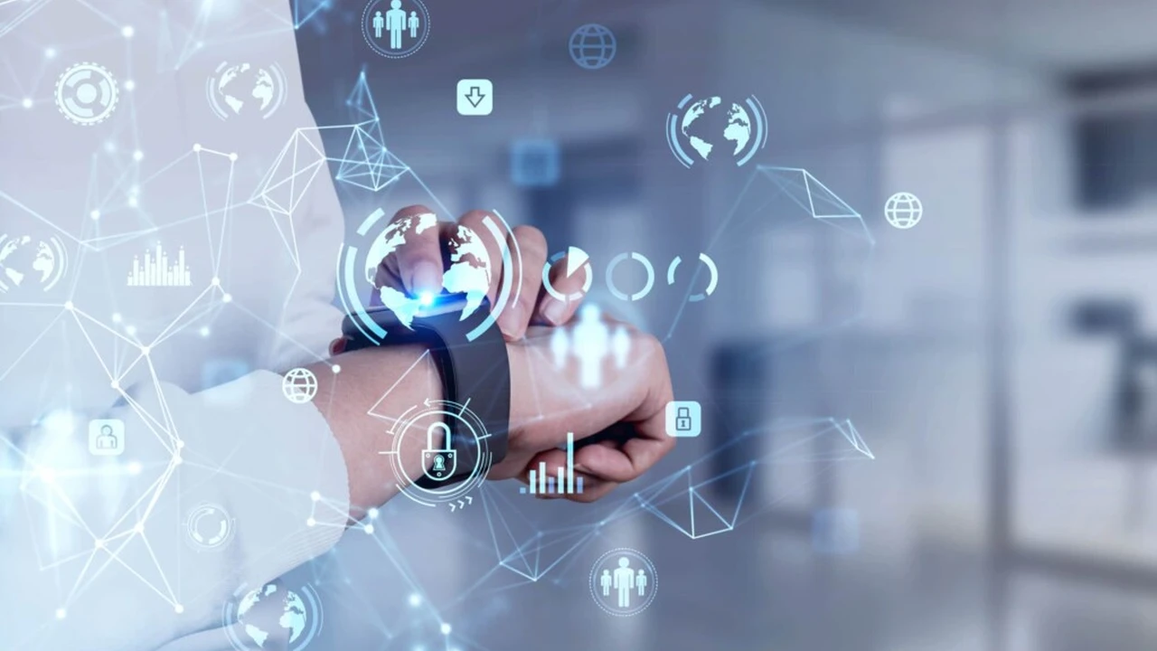Close up on a plate of mashed potatoes, topped with baked pork chops with cream of mushroom soup, and a side of green beans.